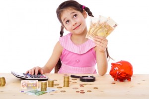 Girl at the table counts money